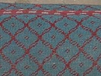 Turquoise with red diamonds Moquette