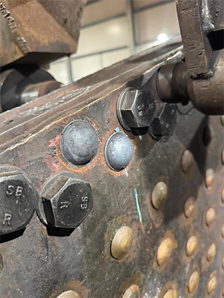 Riveting in the foundation ring. Photo: Leaky Finders