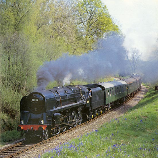 May Day 2000, and No. 92240 is seen among the Bluebells in Lindfield Wood - Mike Esau