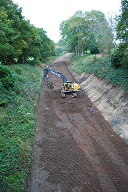 Trackbed clearance and levelling at Hill Place Farm bridge - Pat Plane - 28 October 2010