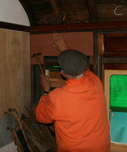 Frank Ferris pins one of the new panels, 29 May 2011