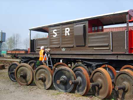 Queen Mary brake van being signwritten - Andy Prime - 12 April 2007