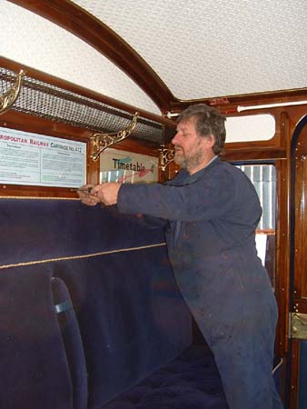 Ray Medhurst putting a finishing touch to the interior of 412 - 9 December 2006 - Richard Salmon