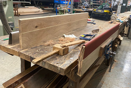 Door capping being fitted to the Oak plank - Laurie Anderson - 28 August 2022