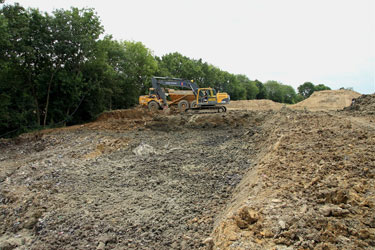Digger and dumper moving clay capping - Mike Hopps - 26 July 2011
