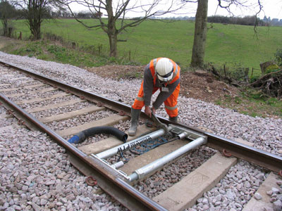 Matt Crawford adjusts the weighbridge with a 'small' spanner - Nigel Longdon - 12 March 2011