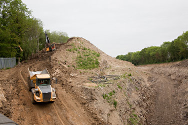 Removing some of the stockpile north of Imberhorne Lane - John Sandys - 31 May 2012