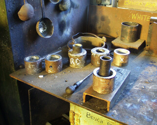 View of coupling rod bushes on white-metal bench