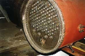 [Picture of front tubeplate with tubes laid in]