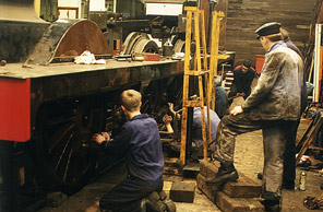 [View of couplig rod being fitted]