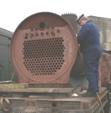 Phil Stoneman needle-gunning the spare C class boiler - Stephen Lacy
