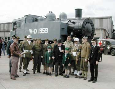 USA tank and uniformed staff and visitors