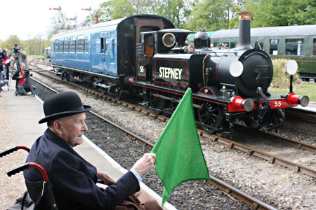Bernard Holden flags Stepney and 6575 into Horsted Keynes - Tony Sullivan - 17 May 2010