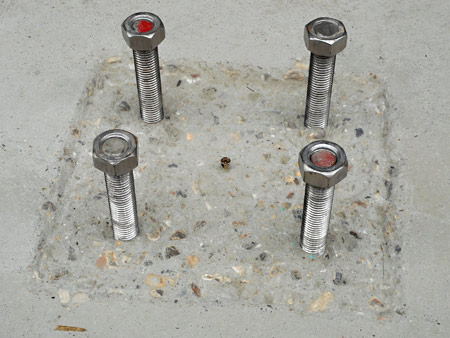 Depression cut into concrete surface, with datum screw fitted - Jon Goff - 17 March 2017