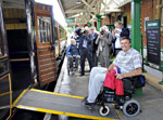 Paralympian Richard Schabel boards the newly restored Victorian carriage - Derek Hayward - 26 May 2011